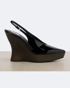 Alaïa Slingback-Clogs aus Leder mit Keilabsatz Schwarz