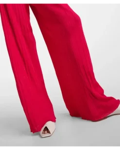 Alaïa Trägerloser Jumpsuit aus Strick Rot