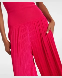 Alaïa Trägerloser Jumpsuit aus Strick Rot