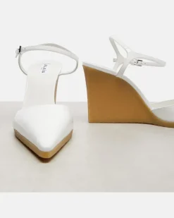 Alaïa Wedges 90 aus Lackleder Weiß