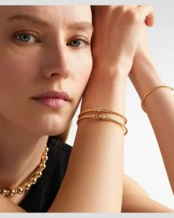 Armreif Cablespira® Flex X Micro aus 18kt Gelbgold mit Diamanten