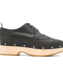 Clogs mit Budapestermuster - Schwarz