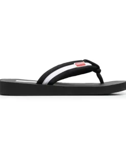 Gestreifte Flip-Flops mit Logo - Schwarz