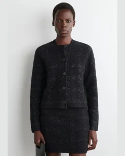 Glitzernde Bouclé-Strickjacke Schwarz