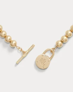 Goldfarbene Perlenkette mit Logo