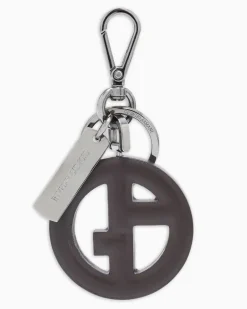 Schlüsselanhänger aus Leder mit rundem Cut-out-Emblem Braun