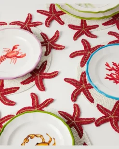 Set aus vier Tischsets Orange