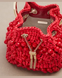 Verzierte Bucket Bag Bon Bon Small aus Raffiabast Rot